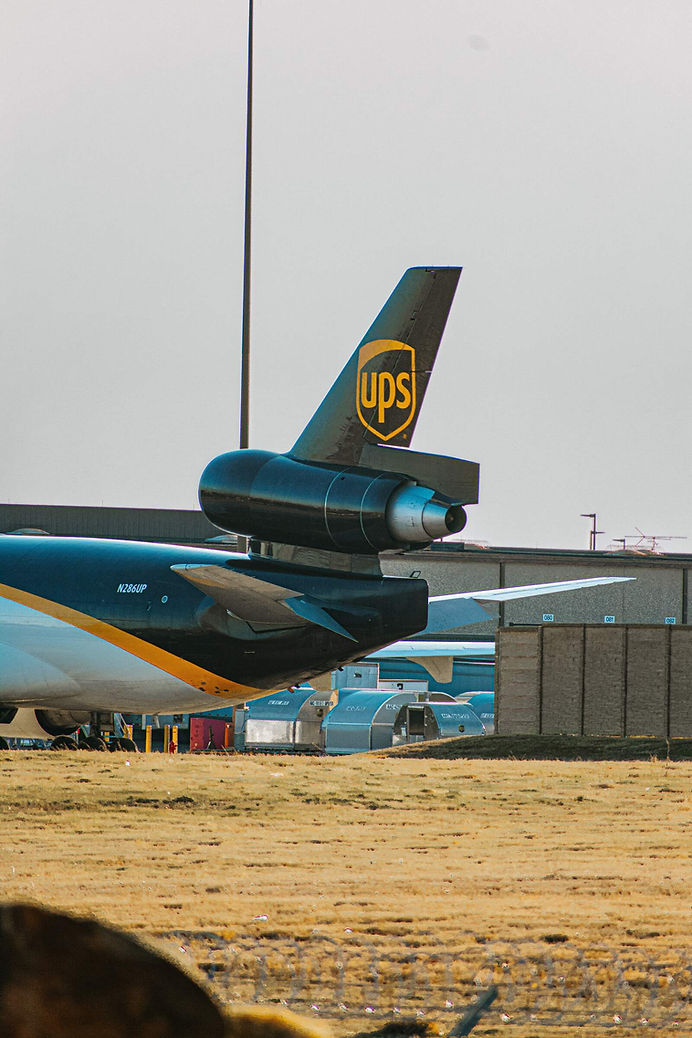 UPS jet to show air services receive surcharge for expedited weekend shipping. 
