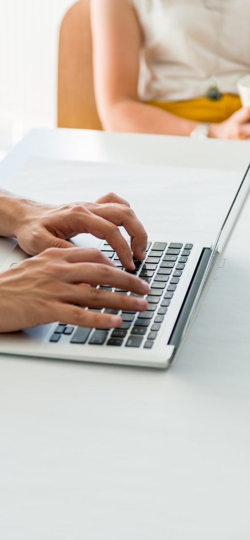 individual using a laptop